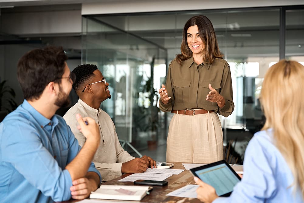 Woman consultant speaking to a business group